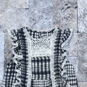 Cute little crop top with ruffles front and back